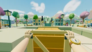 Actual first-person gameplay: both hands pushing a wooden crate, with the town and mountains in daylight
